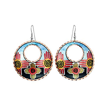 Colorful Native American Zia earrings with a stylized sun symbol. Copper artisan off-center cutout design for tribal jewelry lovers. - Front Line Jewelry