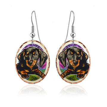 FRONT LINE JEWELRY handmade copper dog earrings feature an oval shape and a lavender backdrop design, perfect for those who love Doxie dogs (Doxie)