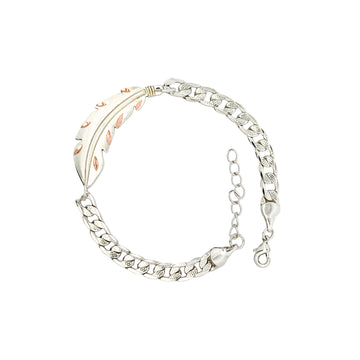 Silver chain bracelet on a white background