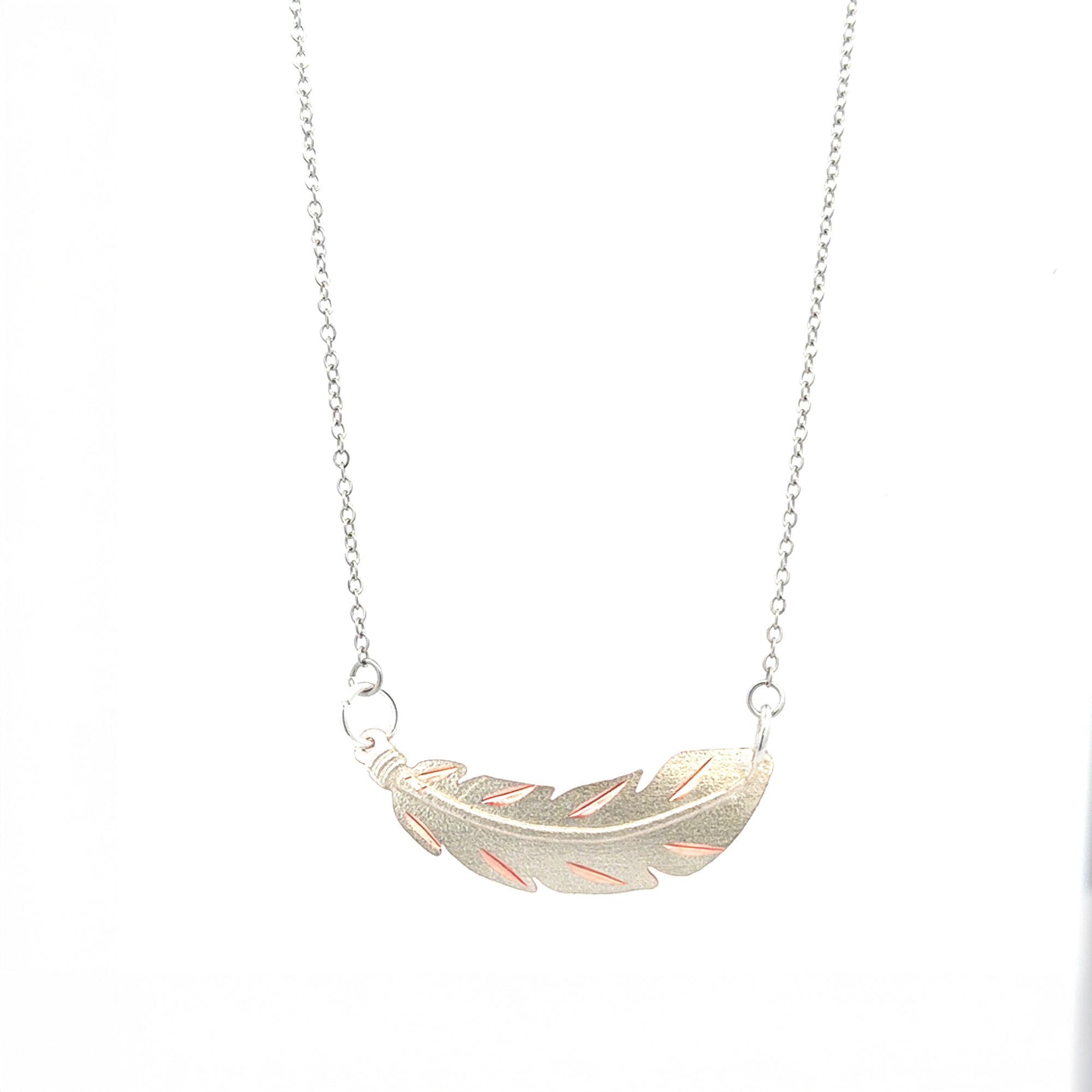 Silver feather pendant necklace on copper base with stainless steel chain
